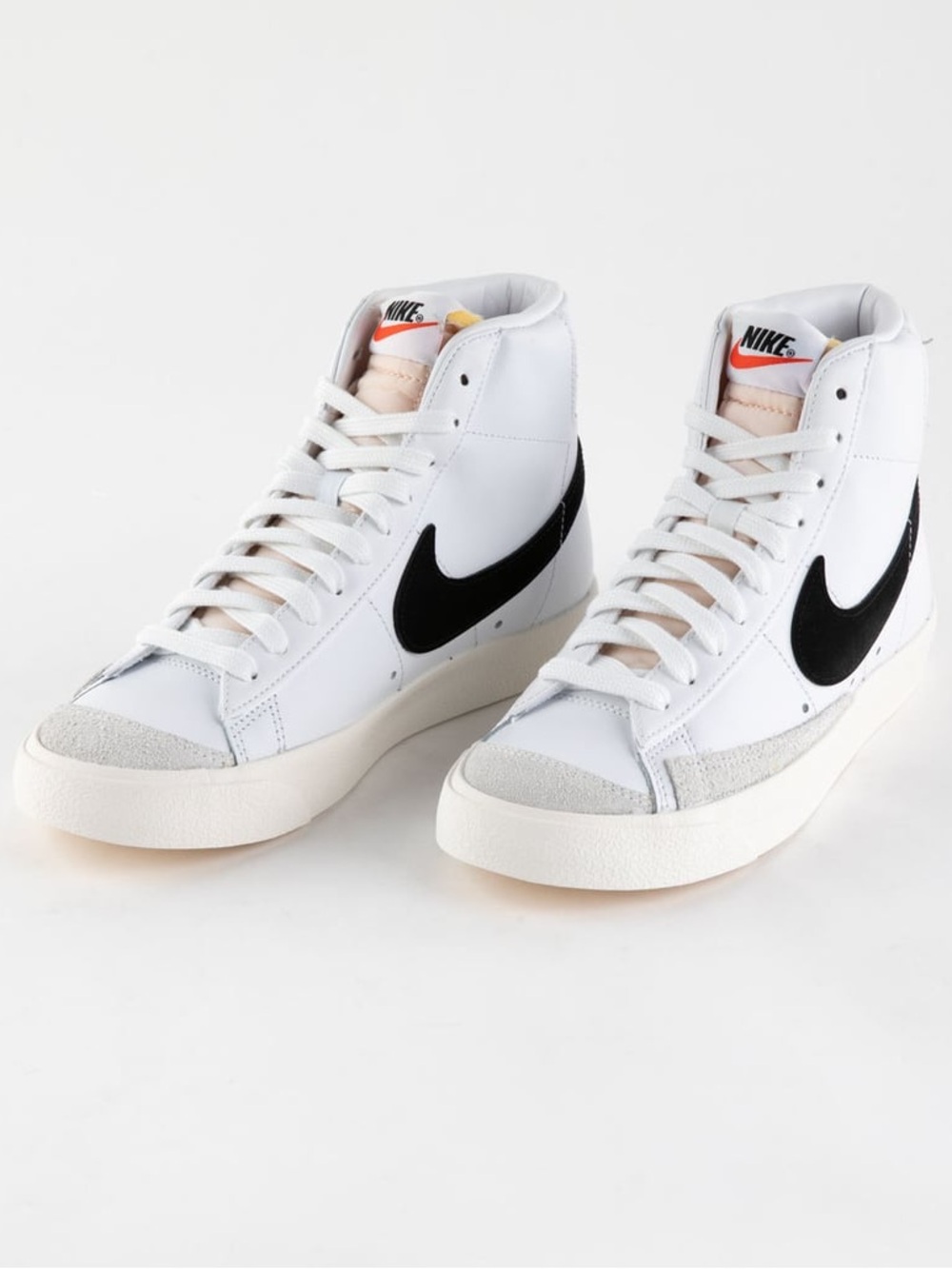 Nike White and Black High-Top Sneakers with Orange Tongue Accent